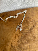Load image into Gallery viewer, Sterling Silver or Gold Wing Charm
