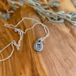 Load image into Gallery viewer, Ash and Silver Infused Tiny Initial, Birth Flower or Paw Pendant
